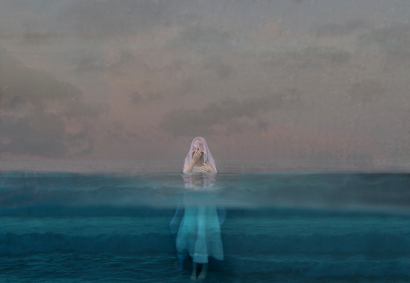 An ethereal image of a woman emerging from a body of water, blending elements of fantasy and nature.