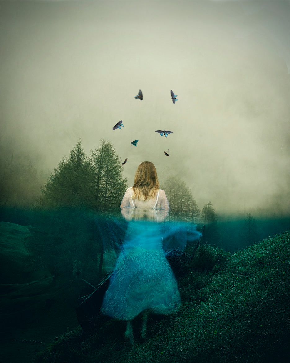 A styled photograph featuring a girl in a blue dress with butterflies around her, set against an underwater-themed background with trees and mist.