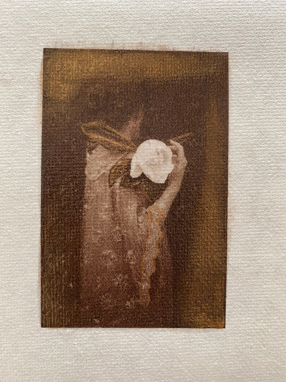 A mini hand-painted artwork featuring a girl with a magnolia flower, with an antique gold frame.