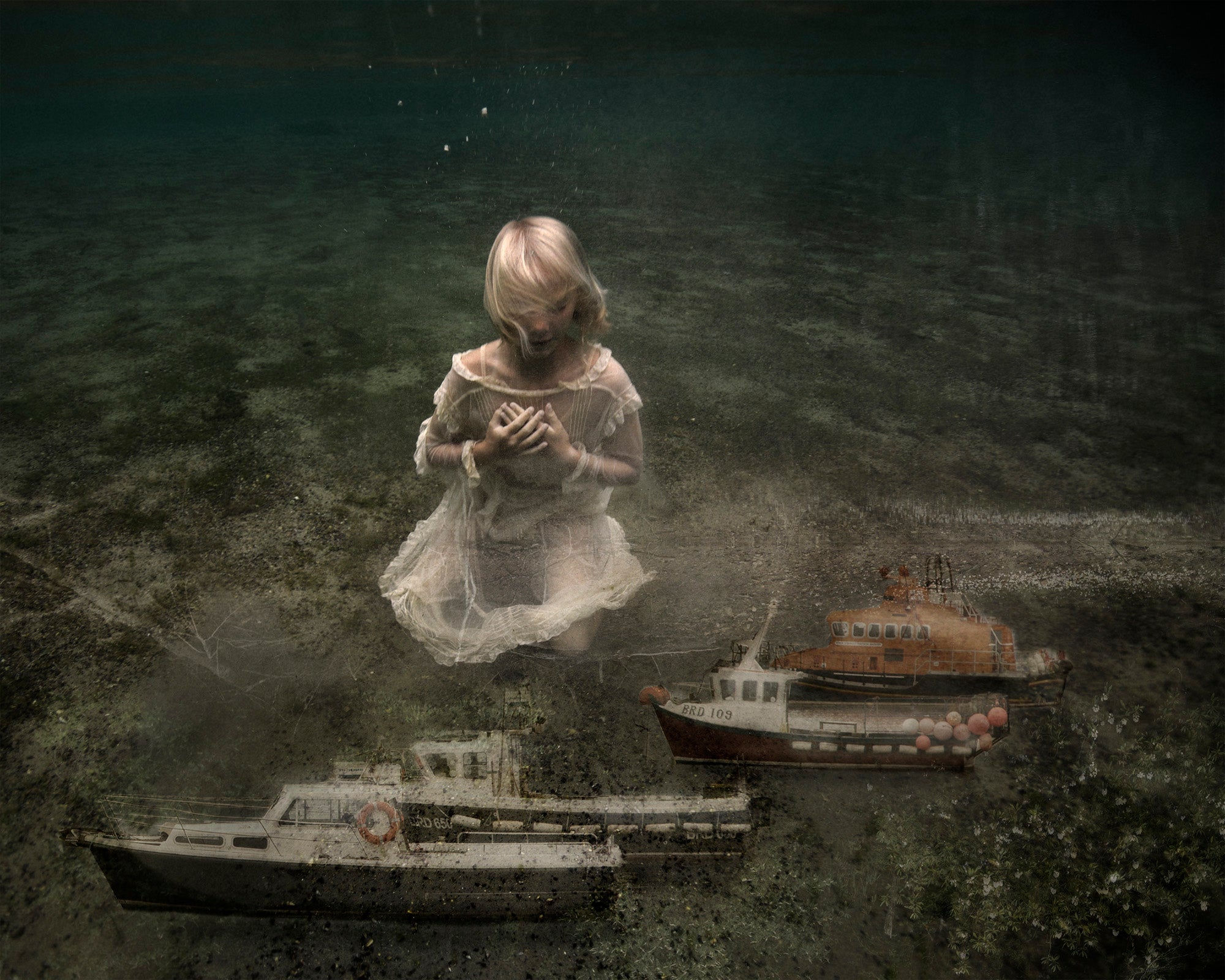 An artistic representation of a person floating underwater with ships in the background, evoking a sense of mystery and serene contemplation.