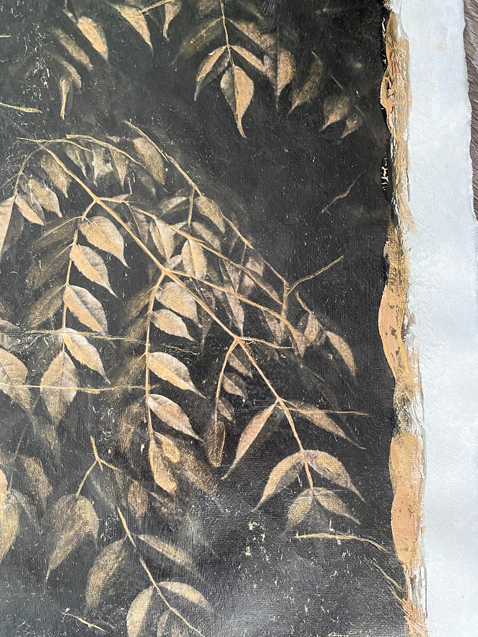 pigment printed photo of leaves hand painted with gold ink