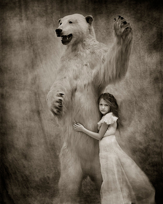 girl holding wild polar bear