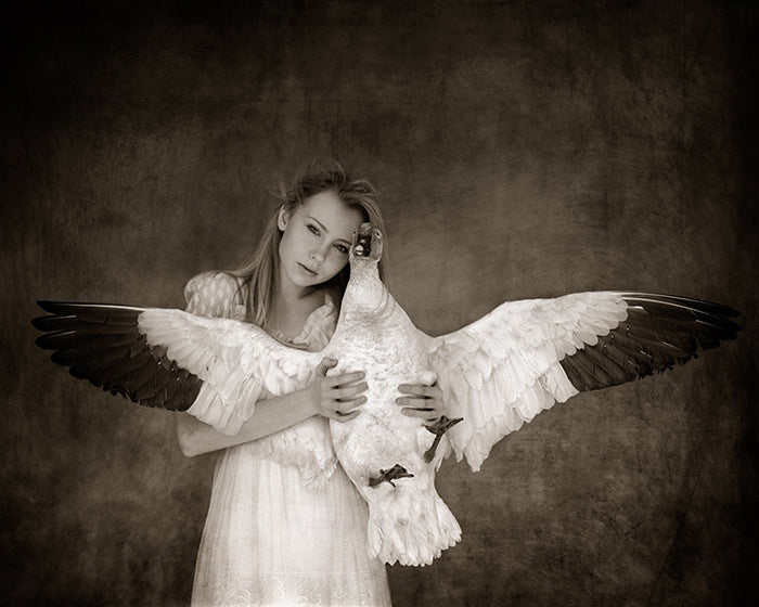 girl holding wild goose