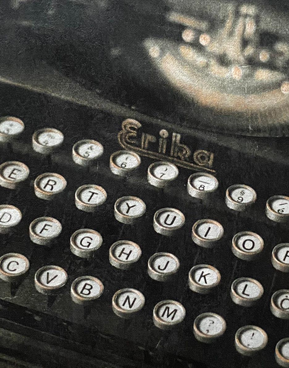 vintage typewriter named erika hand painted with gold