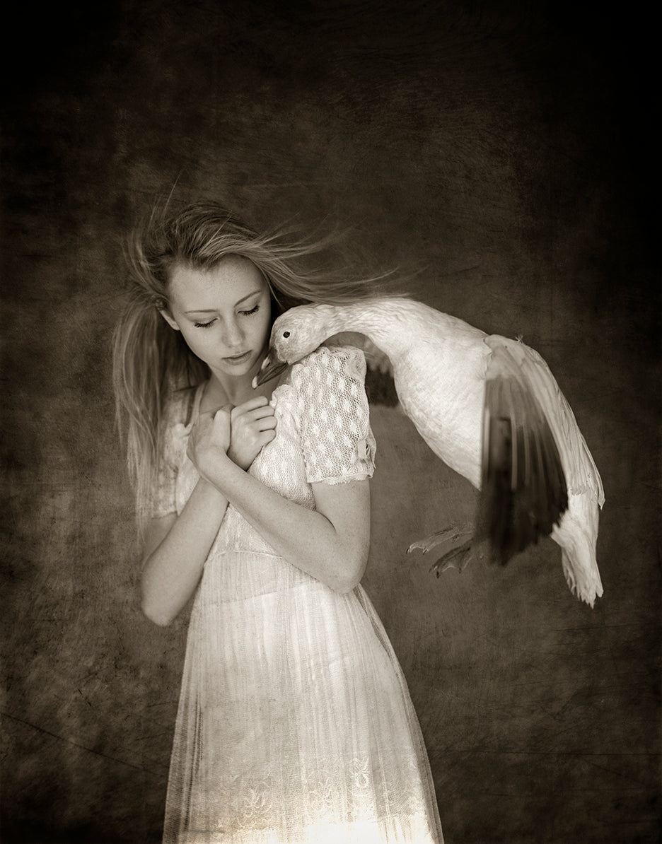 girl being greeted by her beloved goose